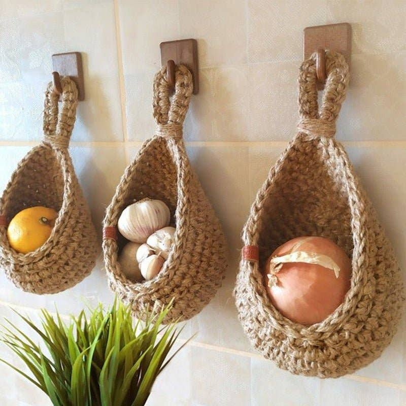 Woven hanging storage baskets for wall decor and kitchen organization in boho farmhouse style